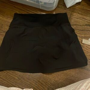 Black Luluemon pace rival mid-rise skirt